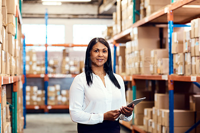 Buy stock photo Portrait of a mature factory manager using a digital tablet in a warehouse