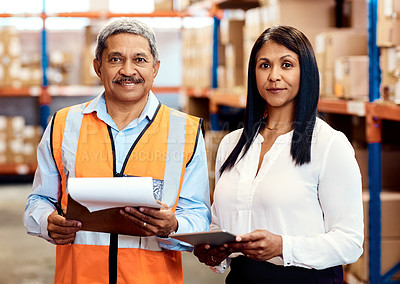 Buy stock photo Portrait of a mature man and woman working together in a warehouse
