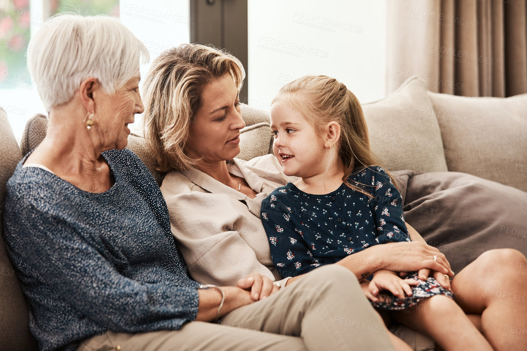 Buy stock photo Mother, child and relax on sofa with bonding, relationship development and talk on weekend break. Grandmother, mom and happy kid in home with conversation, love connection and support with childcare