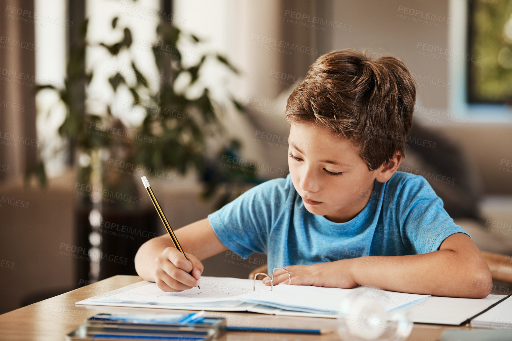 Buy stock photo Child, writing and homework in home, education and student with book for fine motor skills or learn. Cognitive development, knowledge and boy with notes, back to school and assignment in house