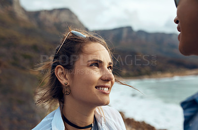 Buy stock photo hot of a happy young couple sharing a romantic moment on a vacation along the coast