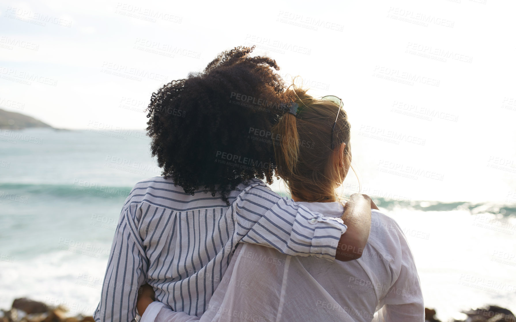 Buy stock photo Friends, hug and view with women on beach together for holiday, travel or vacation from back. Horizon, seaside and space with people embracing outdoor on coast for bonding, trip or weekend getaway