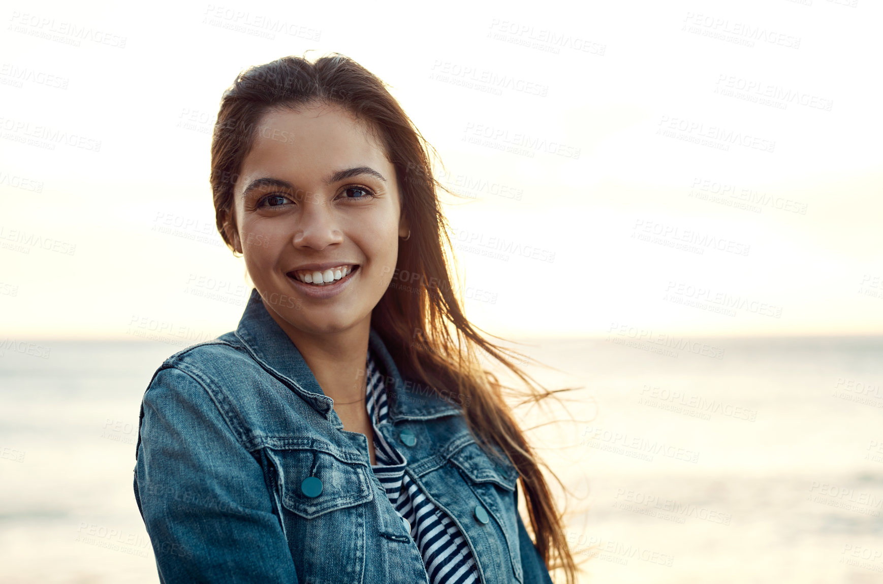 Buy stock photo Travel, portrait and happy woman at beach with trip, fresh air and positive attitude on vacation. Wellness, space and person with good mood, calm moment and unwind satisfaction on outdoor getaway.