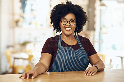 Buy stock photo Shot of a coffee shop owner smiling at the camera