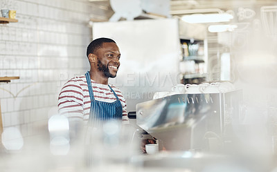 Buy stock photo Cropped shot of a handsome barista operating a coffee machine
