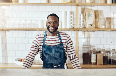 Buy stock photo Cropped shot of a young shop owner standing in his cafe