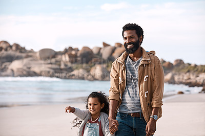 Buy stock photo Shot of an adorable little girl having a fun day at the beach with her father
