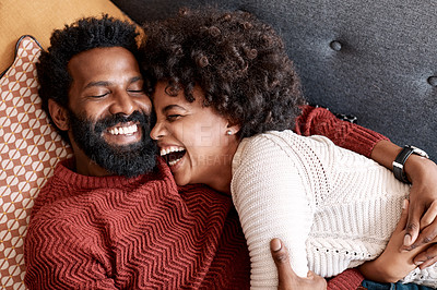Buy stock photo Cropped shot of an affectionate couple relaxing on the sofa at home