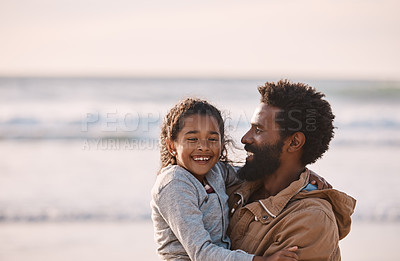 Buy stock photo Shot of an adorable little girl having a fun day at the beach with her father