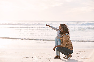 Buy stock photo Shot of an adorable little girl having a fun day at the beach with her father