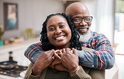 Buy stock photo Portrait of a mature couple spending quality time together at home