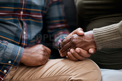 Buy stock photo Closeup shot of a mature couple holding hands at home