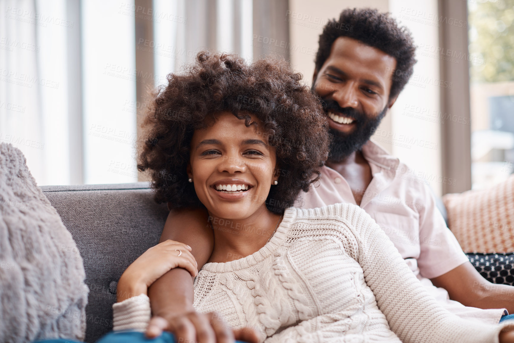 Buy stock photo Relax, portrait and couple in house with love, connection and bonding together on weekend break. Chill, partner and African people with security, happy moment and day off in romantic relationship.