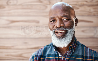 Buy stock photo Portrait of a mature man standing against a brown background