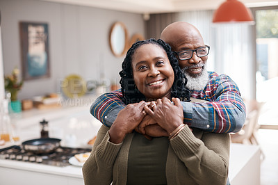 Buy stock photo Portrait of a mature couple spending quality time together at home