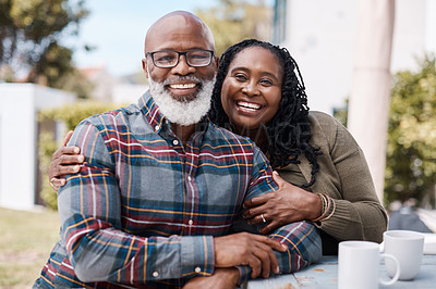 Buy stock photo Portrait of a mature couple spending quality time together outdoors