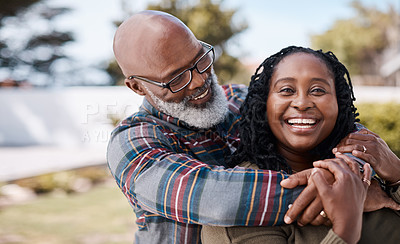 Buy stock photo Portrait of a mature woman spending quality time with her husband outdoors