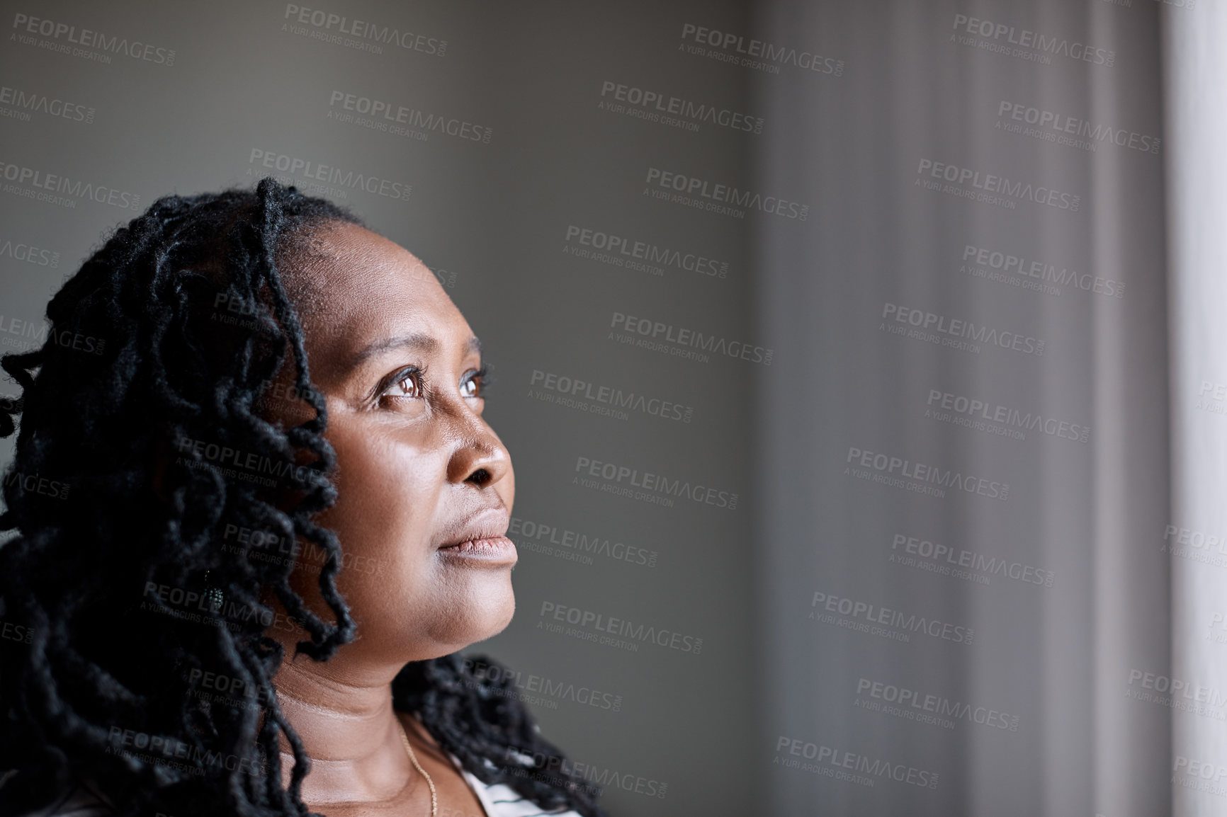 Buy stock photo Relax, thinking and black woman by window with memory, nostalgia and daydreaming in home. House, morning and mature person in living room with reflection, planning day and thoughtful on weekend break