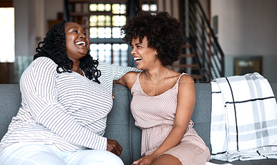 Buy stock photo Shot of a happy young woman bonding and spending time with her mother at home