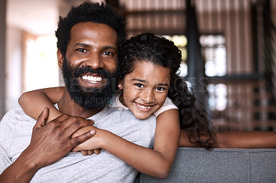 Buy stock photo Portrait of an adorable little girl bonding and spending time with her father at home