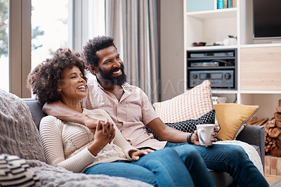 Buy stock photo Cropped shot of an affectionate couple relaxing on the sofa at home
