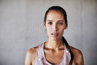 Buy stock photo Cropped portrait of an attractive young female athlete working out in the city