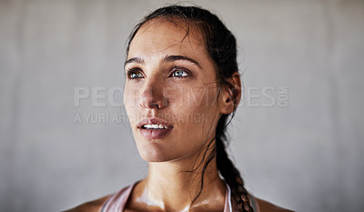 Buy stock photo Cropped shot of an attractive young female athlete working out in the city