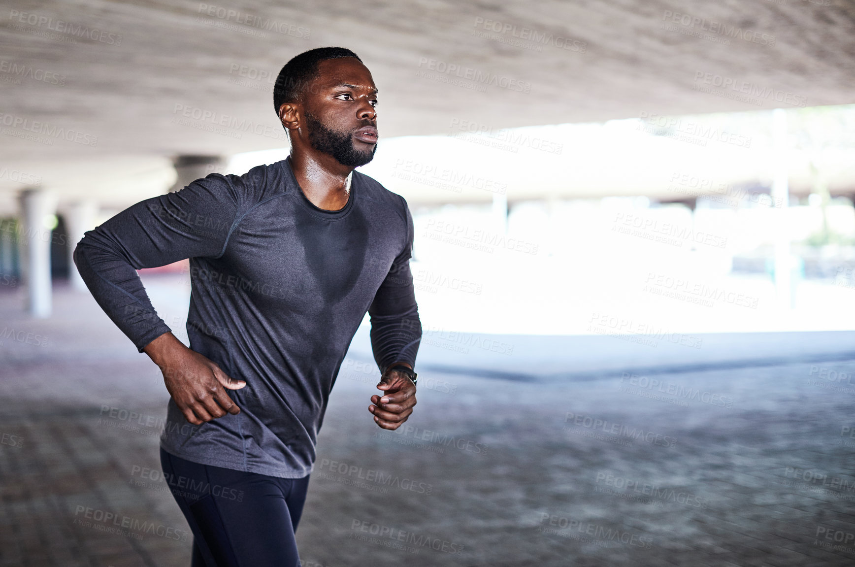 Buy stock photo Running, fitness and black man with cardio exercise underground with space, health or wellness. Male person, workout routine and commitment to athlete training, sport or challenge for self care