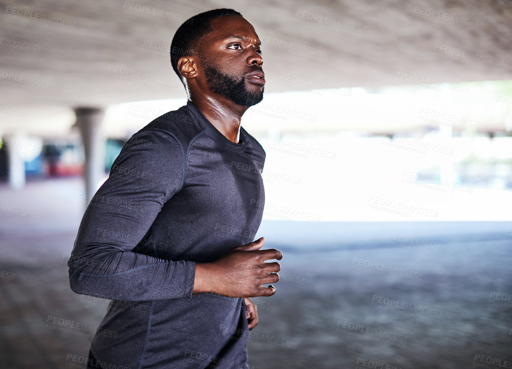 Buy stock photo Runner, fitness and black man with cardio exercise underground with space, health or sweat. Serious person, workout routine and commitment to athlete training, sport or challenge for self care