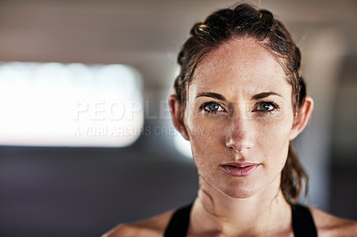 Buy stock photo Cropped portrait of an attractive young female athlete working out in the city