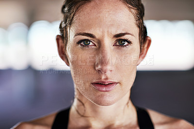 Buy stock photo Cropped portrait of an attractive young female athlete working out in the city