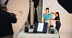 Preparation, photoshoot and people on set with stylist, getting ready and clothing option in studio. Collaboration,  model or film team with planning, fashion catalog or backstage in media production