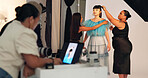 Preparation, photoshoot and team on set with stylist, getting ready and clothing option in studio. Collaboration, model or people with planning, fashion catalog or backstage in film production.