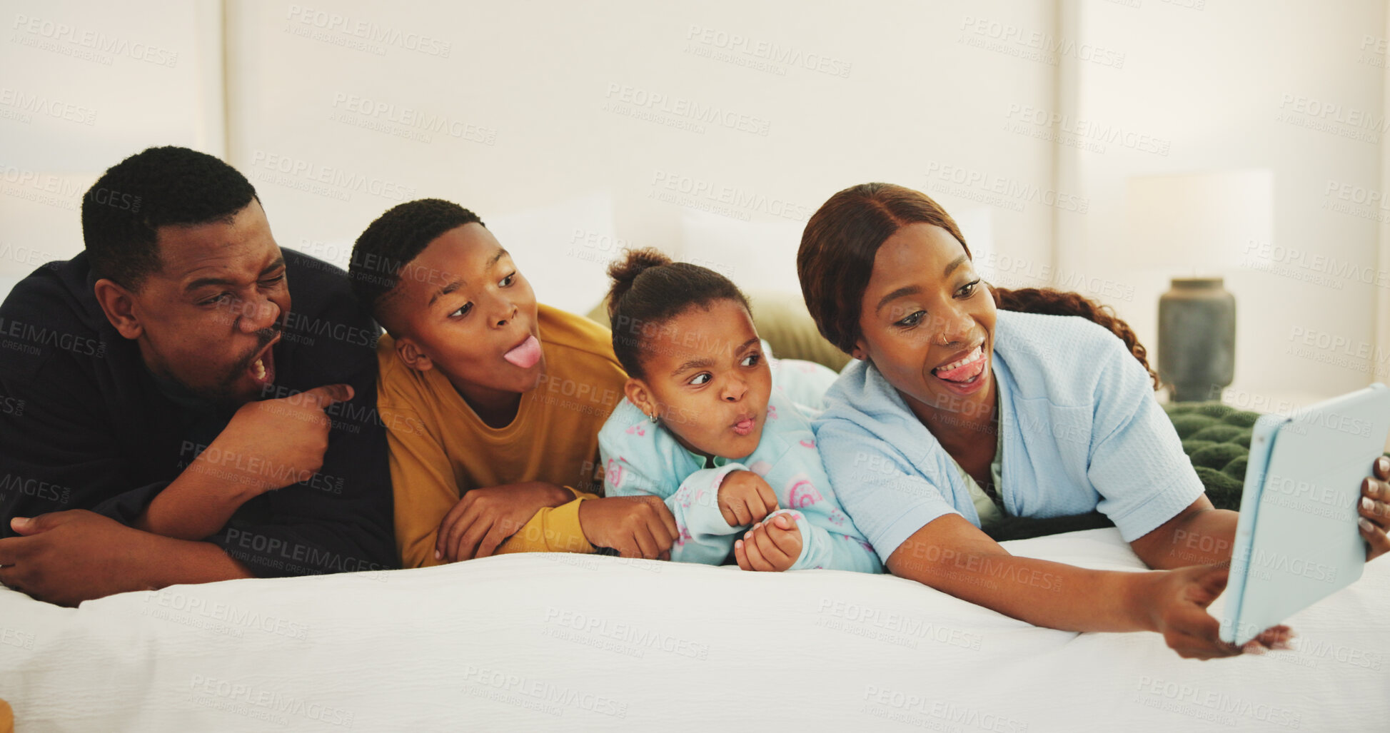 Buy stock photo Silly, parents and children in bedroom with selfie, photography and social media post for love. Goofy, black family and relax at house with kids, profile picture update and capture memory for bonding