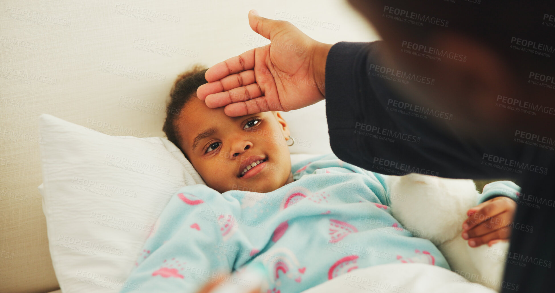 Buy stock photo Fever, hand and parent with child in bed of family home for sick, illness and influenza symptom. Medical, support or cold season with kid and person in apartment bedroom for help and healthcare