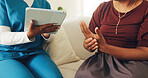 Nurse, consultation and patient hands with arthritis, help and tablet for medical research in home. People, healthcare worker and appointment in house with tech, joint pain and disease diagnosis.