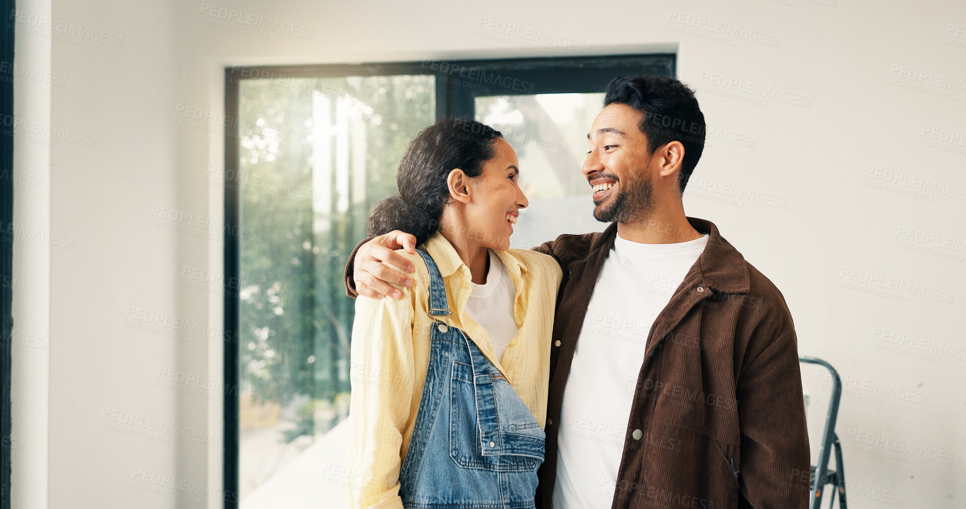 Buy stock photo Love, renovation and hug with couple in new house for interior design, support and property development. Happy, home improvement and remodeling project with man and woman in apartment for partner