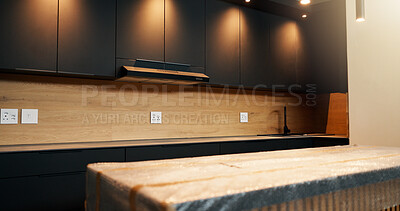 Buy stock photo Empty, room and kitchen renovation with cabinetry for modern finish, property upgrade or lighting. Interior design, remodeling project and cover for fitted furniture, refurbishment and house makeover