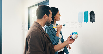 Buy stock photo Renovation, couple and paint sampling on wall for color decision, home upgrade and test coating. Interior design, swatching and people with palette for tone selection, house makeover or decor support