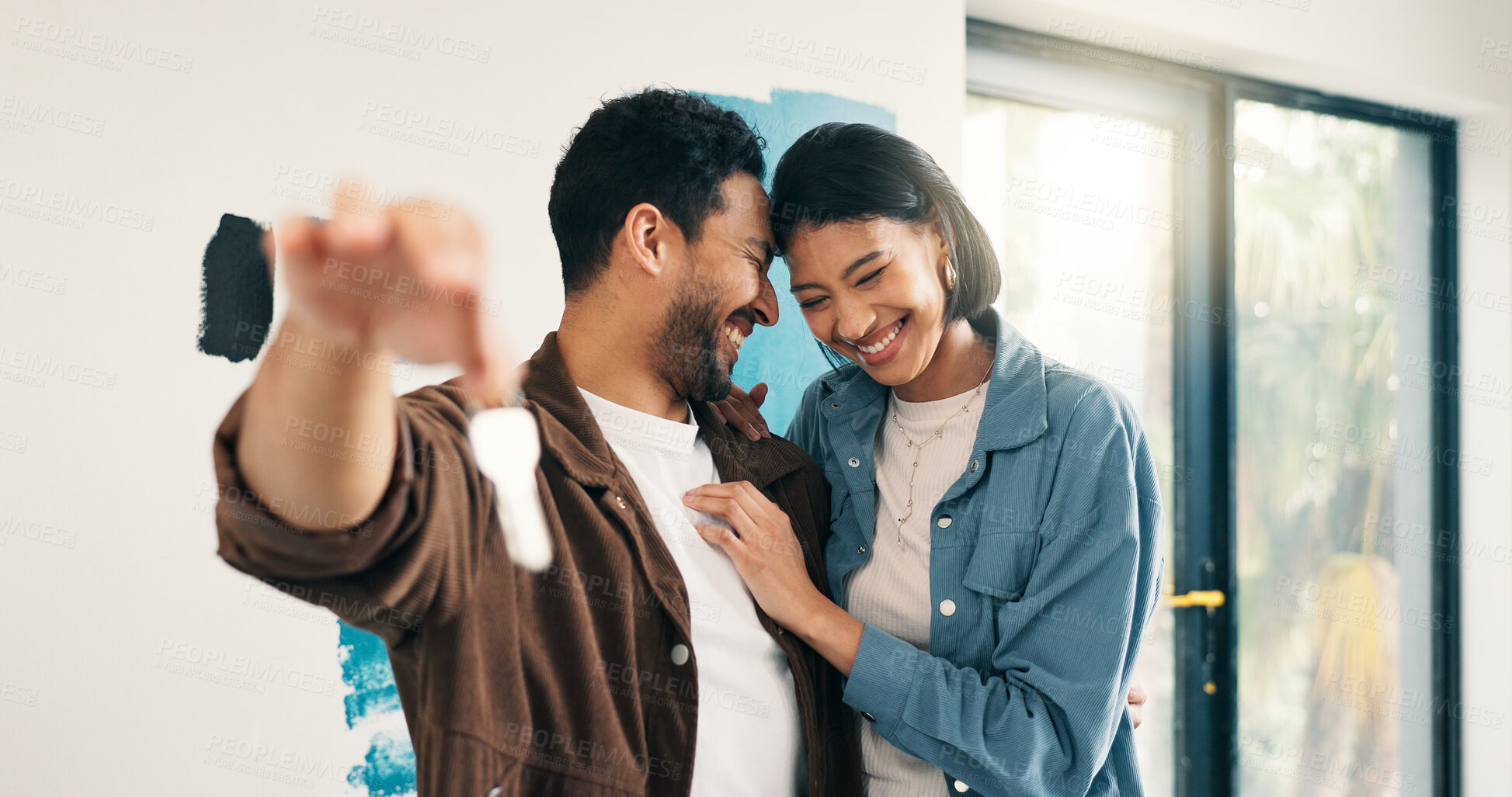 Buy stock photo Real estate, support or couple in home with key, investment or fresh start with house remodeling. Property, renovation or people with purchase, housing success or moving achievement for homeowners.