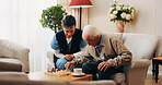 Caregiver, chess and senior man in nursing home with moving pawn, problem solving or bonding together. Nurse, support and elderly person with board game for retirement, cognitive skills and contest.