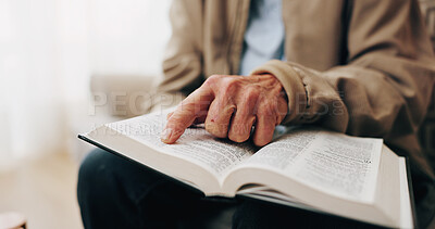 Buy stock photo Senior, hands and reading with bible for faith, religion or worship for spiritual wellness in home. Elderly, male person or holy book with god, scripture or gospel for christianity, praying or belief