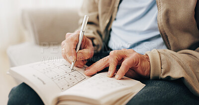Buy stock photo Senior, hands and writing with book for sudoku, number puzzle or thinking game in retirement home. Elderly, male person or cognitive activity with blank blocks for problem solving or skill in house