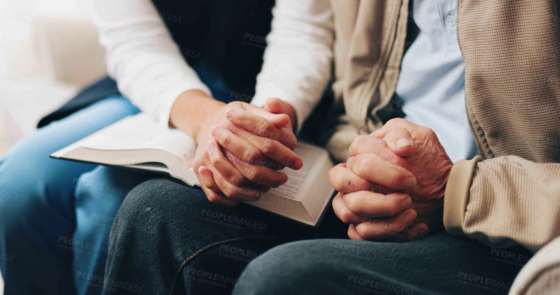 Buy stock photo Nurse, senior and bible with praying hands for faith, religion or belief together in nursing home. People, caregiver or elderly care with holy book for spiritual wellness, worship or christianity