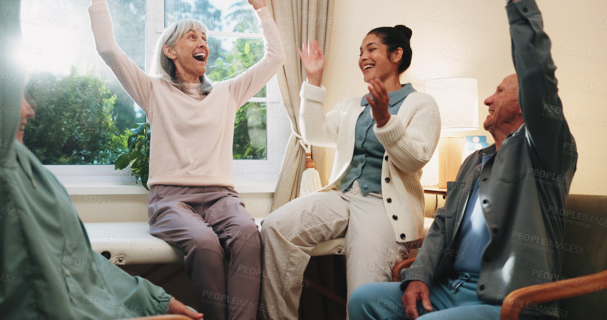 Buy stock photo Celebration, chiropractor and old people in retirement home together for goals, motivation or target. Arms raised, energy and excited with senior friends in physio for healing or rehabilitation