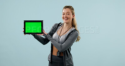 Buy stock photo Green screen, fitness and portrait of woman with tablet in studio for gym membership sign up. Happy, mockup space and sports coach with digital technology for online news on app on blue background.