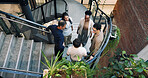 Above, meeting and staircase with business people in office together for creative discussion. Collaboration, conversation and planning with designer team on steps in workplace for feedback or ideas