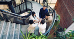 Hands, stack and staircase with business people in office together for creative discussion. Above, collaboration and meeting with designer team on steps in workplace for feedback, success or unity
