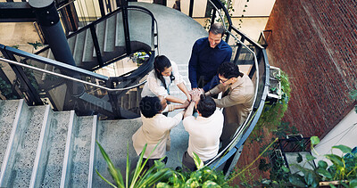 Buy stock photo Hands, stack and staircase with business people in office together for creative discussion. Above, collaboration and meeting with designer team on steps in workplace for feedback, success or unity
