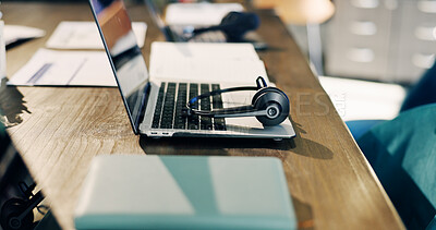 Buy stock photo Empty, office and laptop with headset, documents and financial review for consulting at agency. Desk, background and computer with mic for finance advice, investment or trading service for contact us